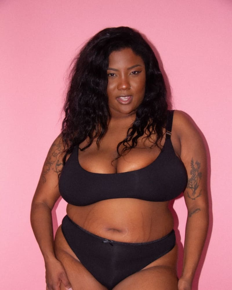 Front of a model wearing a size L Kari Mid-Rise Thong in Licorice by Cherri. | dia_product_style_image_id:273942
